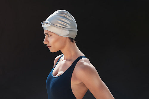 Determined young female swimmer