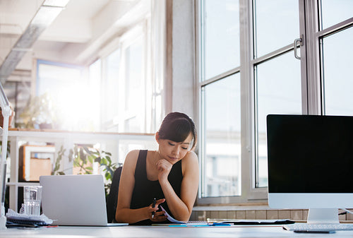 Businesswoman working in modern office