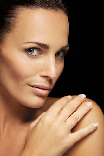 Beautiful young woman with glowing complexion