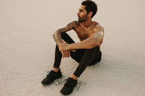 Tired athlete taking a break from outdoor training