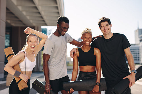 Healthy fitness group standing outdoors