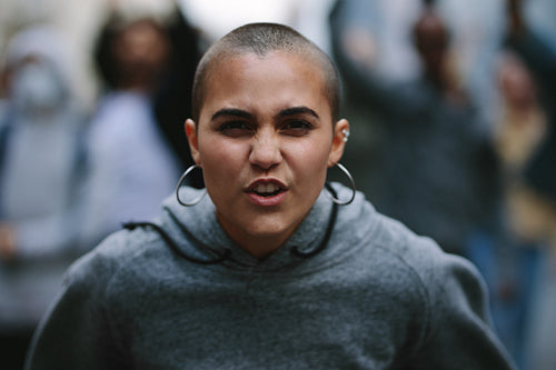 Female activist shouting in a protest march