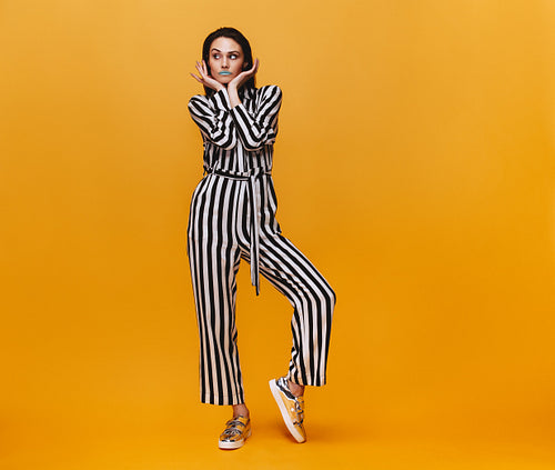 Beautiful young woman with vivid make up