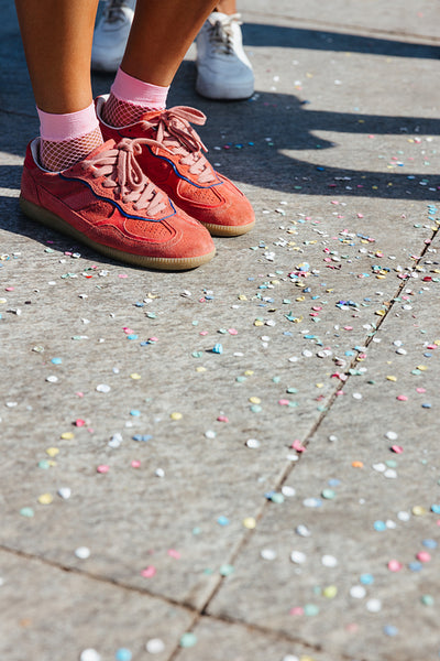 Sneakers on confetti street