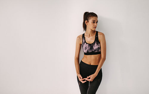 Woman with healthy body resting after workout