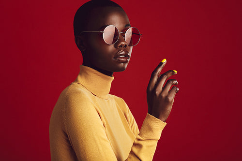 Fashionable female with buzz cut hairstyle