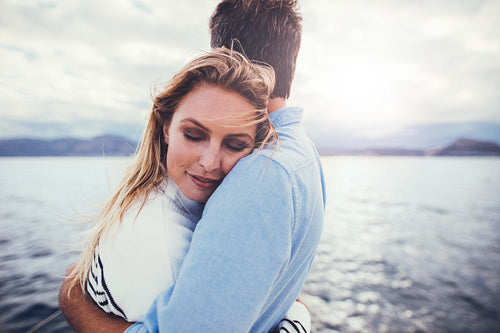 Affectionate young couple on a boat trip
