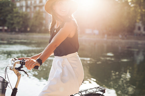 Woman cycling on a summer day