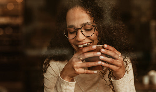 Woman having coffee at a cafe