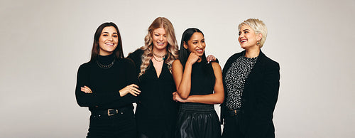 Happy group of women in a studio