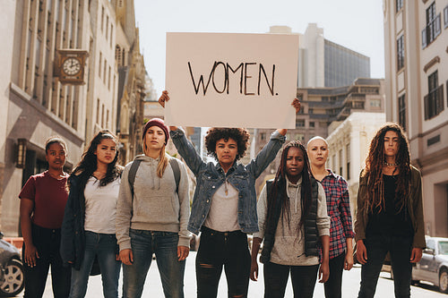 Group of women marching on the road in protest