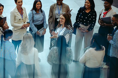 Group of colleagues welcomes a new team member on their first day