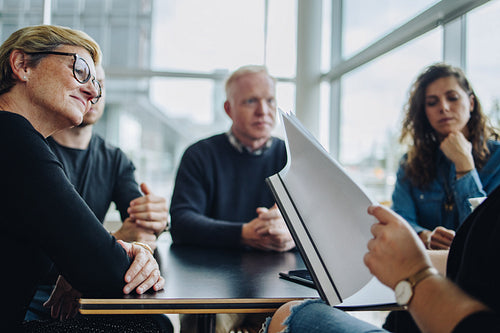 Senior woman in boardroom meeting