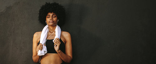 Female athlete resting after workout