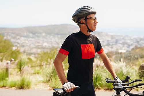 Male cyclist on countryside