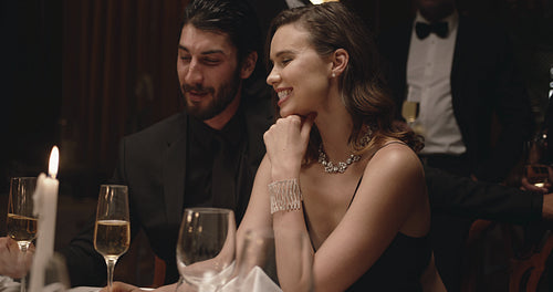 Attractive couple enjoying at dinner party