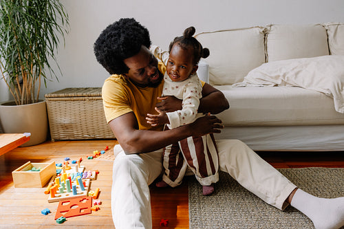 Father playing with his young daughter