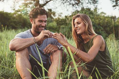 Man proposing to girlfriend on holiday