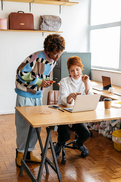 Colleagues collaborating in a bright co-working space