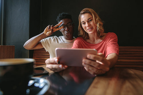 Friends having fun at a coffee shop
