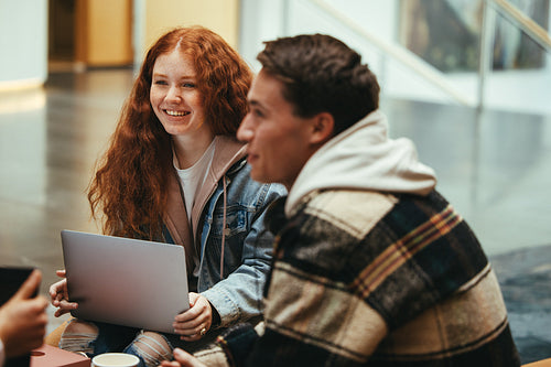 Students studying together in college campus