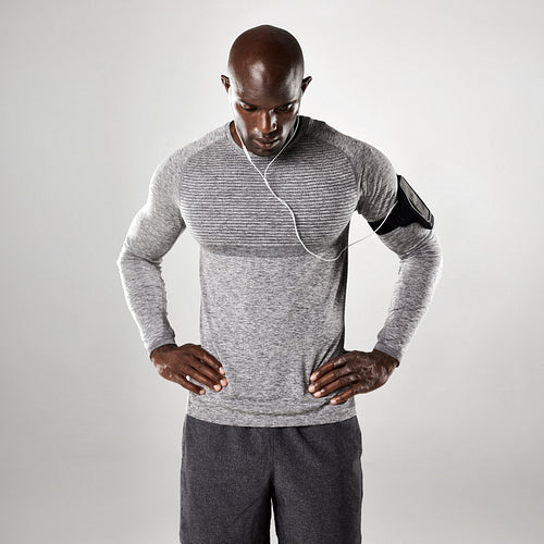 Young african man in long sleeve shirt