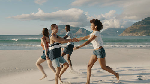 Friends running and enjoying on the beach vacation
