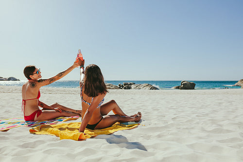 Women sunbathing on beach