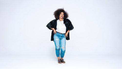 Woman in afro hairstyle having fun