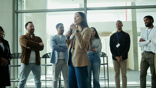 Professional woman speaks to business audience
