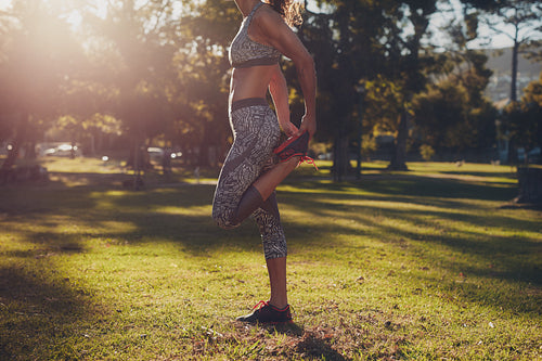Sporty woman exercising at a park