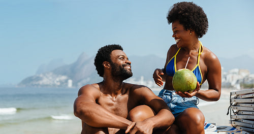 Happy newlyweds enjoying their honeymoon on Ipanema Beach