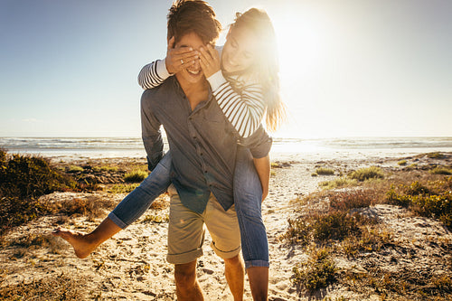 Couple having fun on the beach