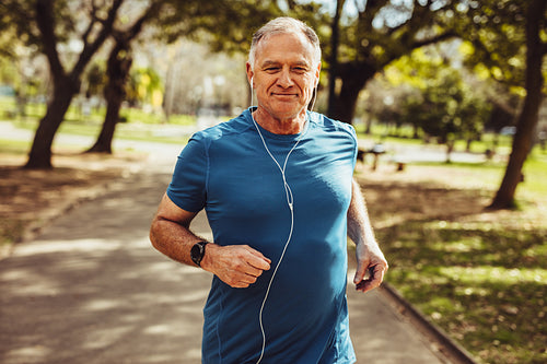 Senior man enjoying his workout in park
