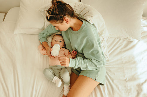 Overhead view of a mother feeding her baby