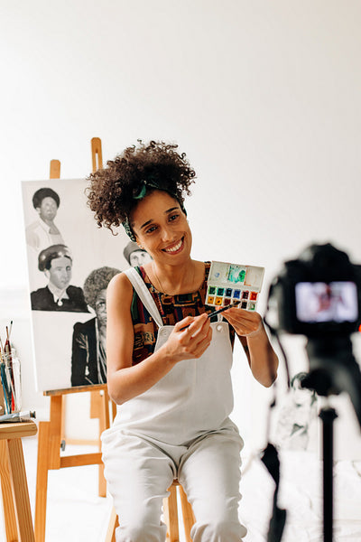 Blogger live streaming her art studio