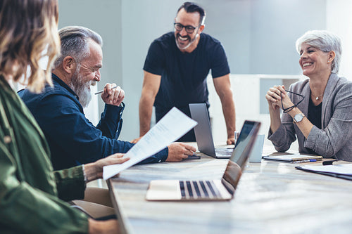 Business people smiling during a meeting
