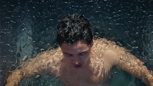 Resilience grows as the man holds steady in an outdoor ice bath
