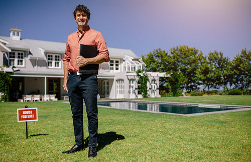 Young male real estate agent