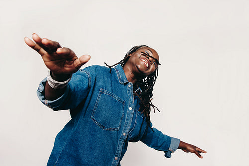 Happy woman having fun in the studio