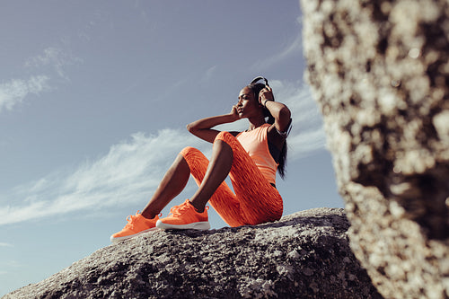 Female taking break after fitness training