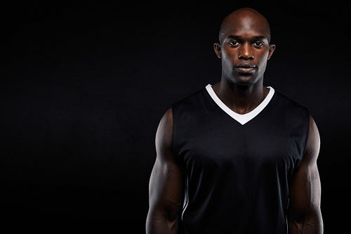 Muscular young man in sportswear