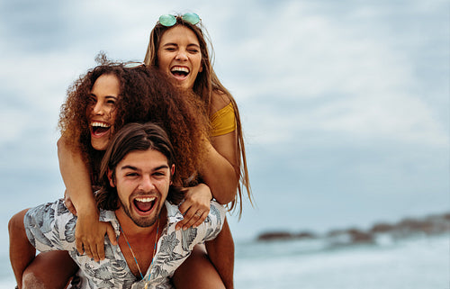 Group of friends enjoying themselves at the beach