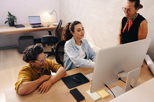 Team discussion in an office setting for collaborative project management
