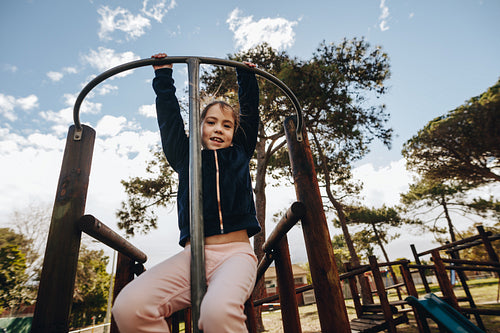 Little girl playing in playground
