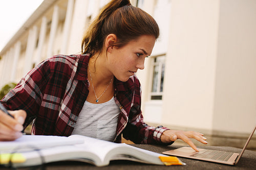 Female student preparing for exams at campus