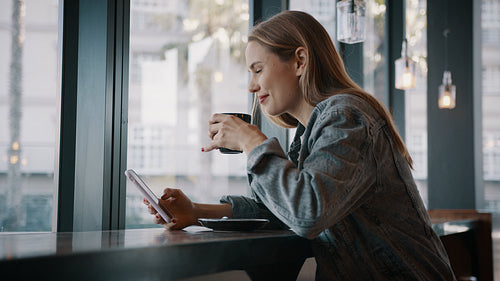 Woman relaxing at a cafe