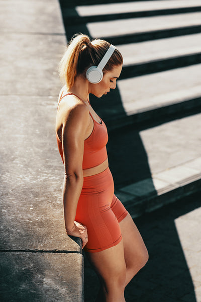 Female runner resting after a jog outdoors