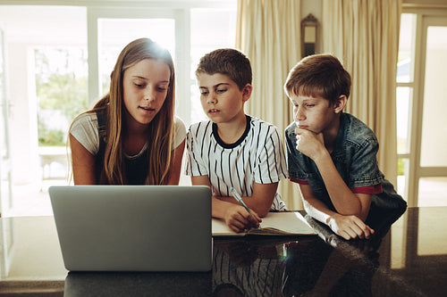 Kids using laptop computer for learning