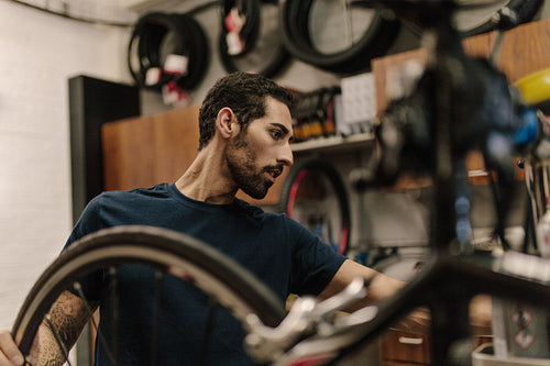 Mechanic in a cycle repair shop